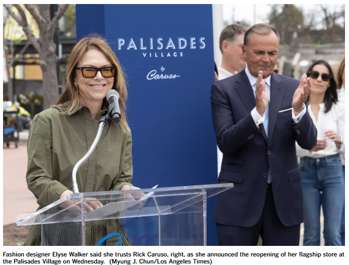 Fashion designer Elyse Walker said she trusts Rick Caruso, right, as she announced the reopening of her flagship store at the Palisades Village on Wednesday. (Myung J. Chun/Los Angeles Times)